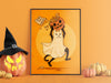 Halloween cat art poster in frame depicting black ghost cat stealing pumpkin with candy with an  "Only take one" sign in front of an orange wall surrounded by different pumpkins and jack o lanterns