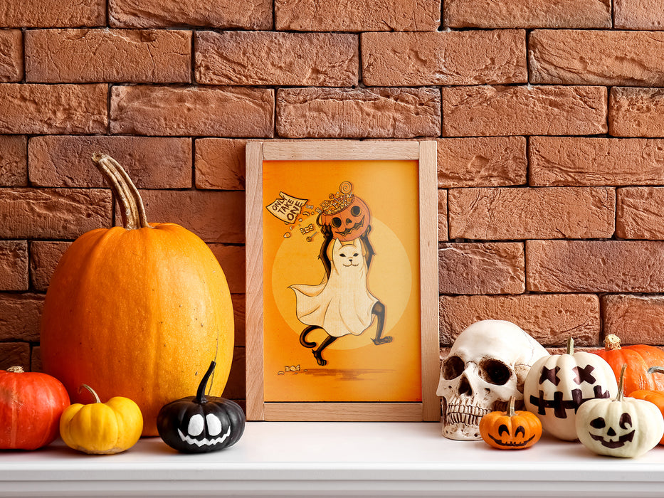 small single photo frame with orange art of black cat dressed as a ghost running with a pumpkin bucket filled with candy with sign that says only take one, photo is on shelf surrounded by pumpkins, jack o lanterns, and skeleton head