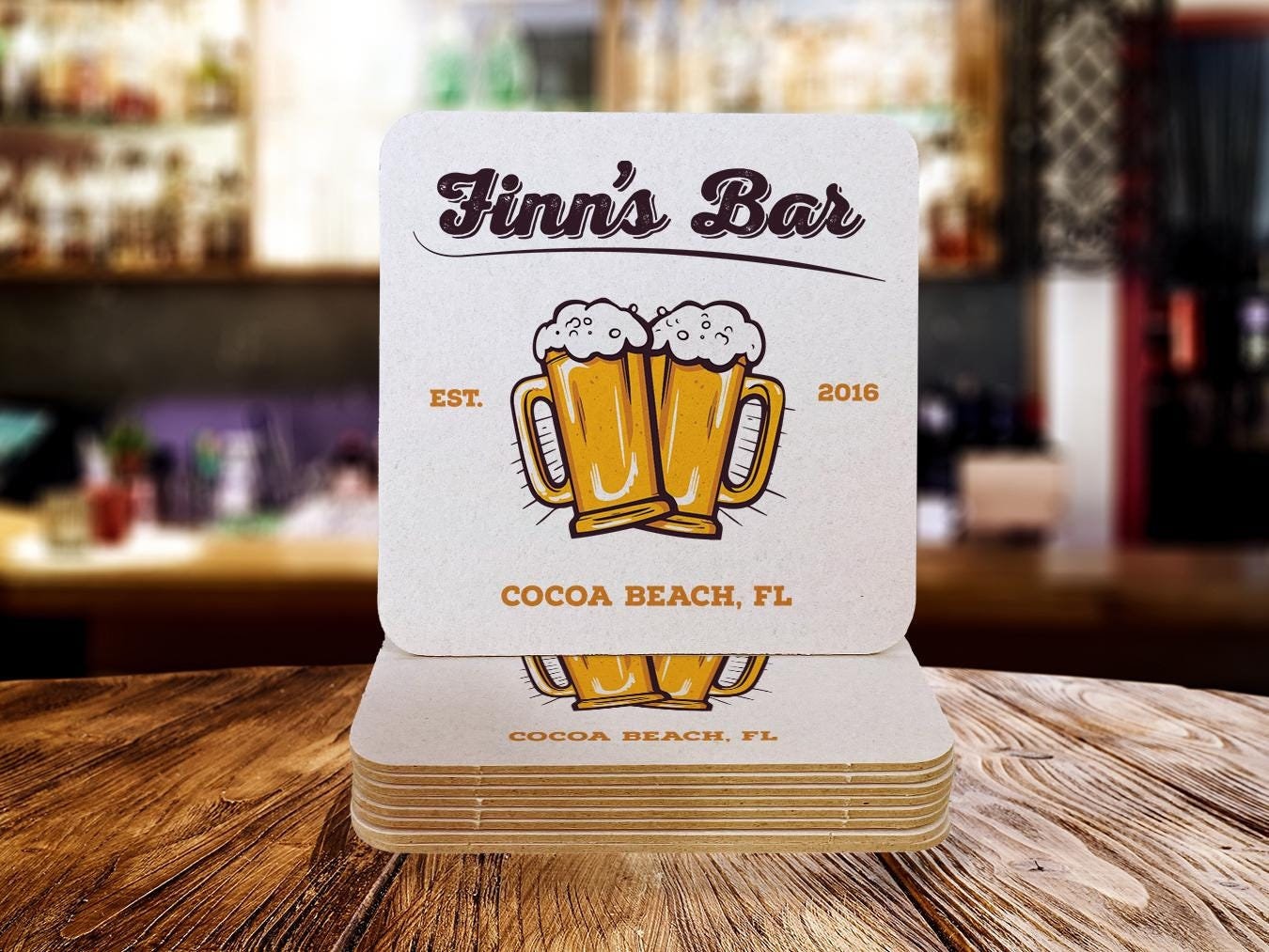 a set of coasters with drinks on them