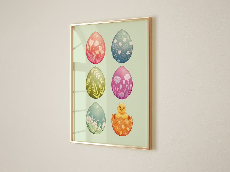 easter print of pastel easter art print of decorated eggs with a baby chick in a gold frame on living room white wall