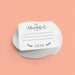 A stack of coasters with black text that reads "I'm Thankful For" on a peach background.
