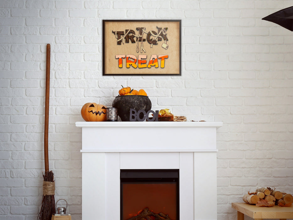 single frame on white brick wall of Wall art of a trick or treat typography design with candy and wood font above a white fireplace surrounded by halloween decoration such as pumpkins, jack o lanterns, and a witches broom