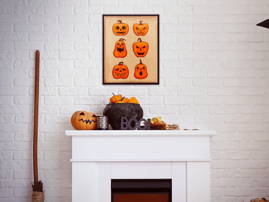 single frame hung up on white brick wall with halloween design of a grid of jack o lantern pumpkin faces with retro vintage patterns and textures over a white fireplace surrounded by halloween decor such as pumpkins, BOO sign, and a broomstick