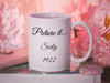 white mug with golden girls inspired typography design with quote that says Picture it...Sicily 1922 in pink room surrounded by flowers, a wallet and sitting ontop of a book