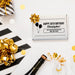 A custom birthday gift box for 2 golf ball sleeves with a personalized message, other gift boxes, and a bottle of champagne, all set against a white background.