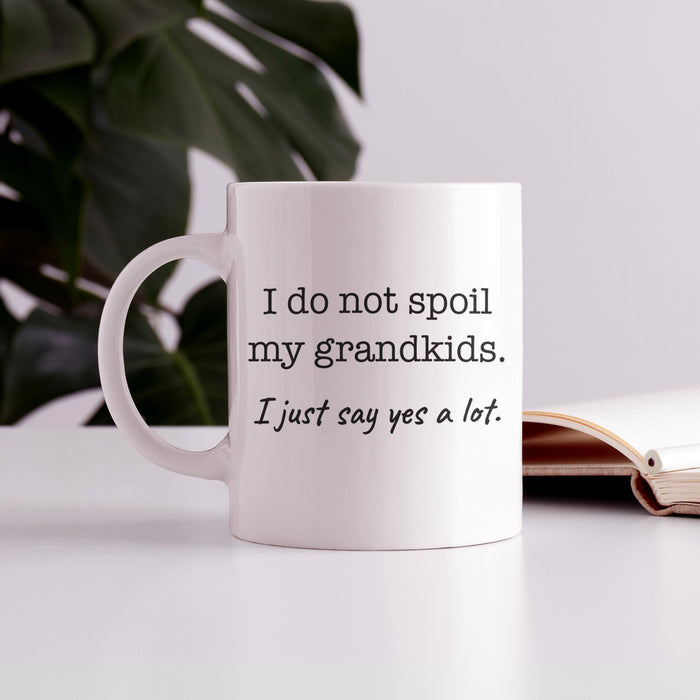 Grandparents coffee mug displayed on a table with humorous grandkids saying.
