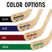 Color options for the personalized hockey stick design, displaying black, blue, red, and green print variations on wooden sticks.