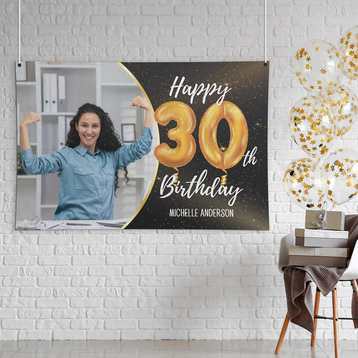 Black and gold birthday banner displayed as wall décor featuring a custom photo, age, and name.