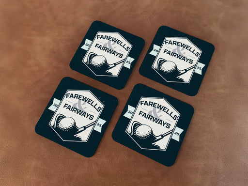 Custom square pulpboard coasters are shown sitting on leather surface. The coaster features design with an illustration of a golf ball and with club behind it and custom text.
