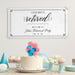 Personalized retirement banner displayed above a celebration table with cake and party decorations. Elegant retirement party sign customized with the retiree's name and date.