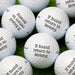 a collection of golf balls with the text "If found return to Jeremy." printed on them.