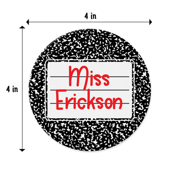 Close-up of composition notebook style personalized coaster with teacher’s name. Shows size and design details. All coasters are 4 by 4 inches.