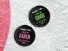 two hockey pucks sitting ontop of an ice rink with green and pink coach appreciation designs with different names