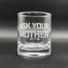Close-up image of an empty whiskey glass with the engraved phrase visible. This view highlights the clean etching and overall glass quality.