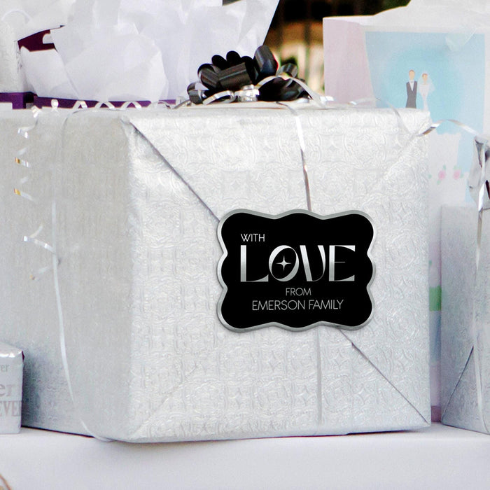 Silver gift bag decorated with a personalized “With Love” foil wedding gift tag in metallic silver. Styled as elegant packaging for weddings, bridal showers, and engagement gifts.