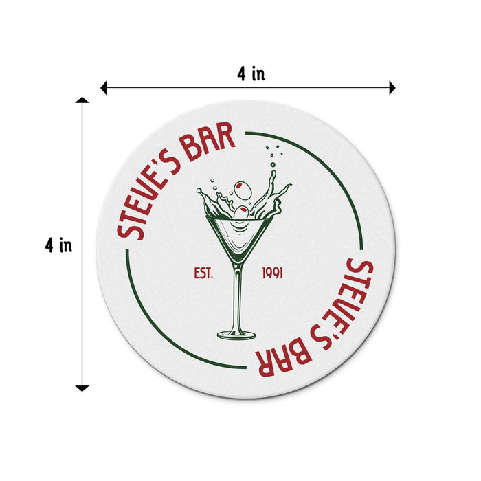 Size guide showing the personalized dirty martini coaster at approximately 4 inches round, with the custom bar name, martini glass design, and established year.