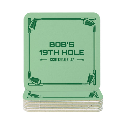 A stack of green square coasters with the text "BOB'S 19TH HOLE SCOTTSDALE, AZ" printed on them.