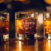 Warm bar-style lifestyle image of the personalized whiskey glass with glowing ambient lights in the background. The “Antony’s Bar” engraving is highlighted beautifully, giving the glass a premium lounge-inspired atmosphere.