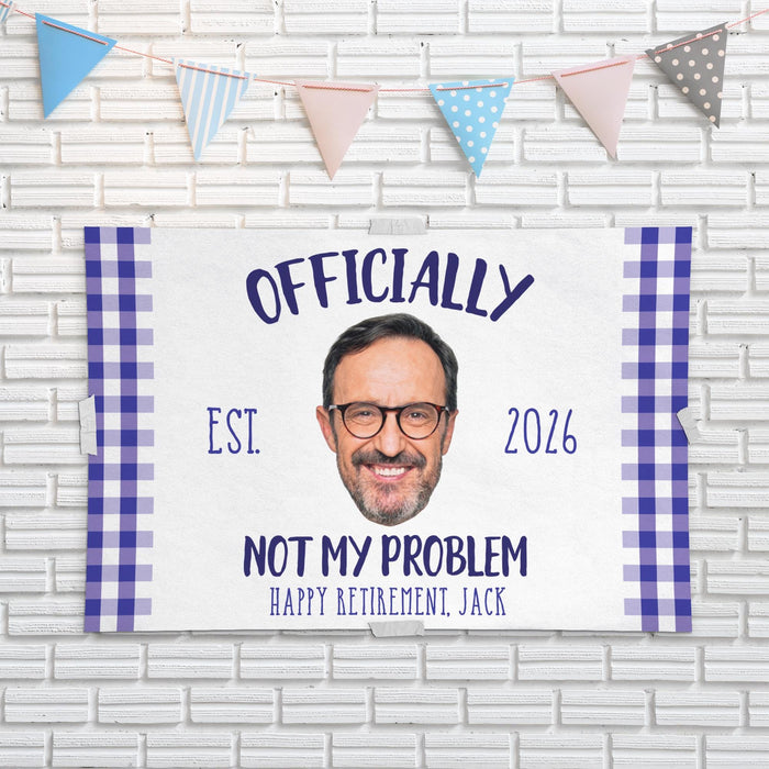 Officially Not My Problem banner displayed against a white brick wall with party bunting. Personalized retirement party backdrop with custom photo and retirement details.