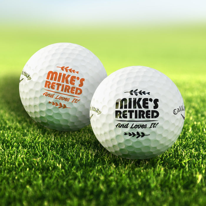 Set of personalized retirement golf balls featuring the "Retired And Loves It" design. Customized with a name and available in multiple print colors.