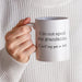 Funny grandma or grandpa mug held in hand with “I Do Not Spoil My Grandkids” design.