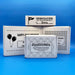 White custom cardboard gift boxes for golf balls with various designs and messages, including a "Happy Father's Day" box. The boxes are shown on a blue background.