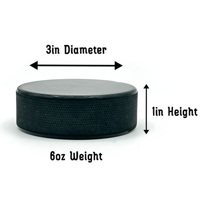 Side view of the personalized birth announcement hockey puck showing its 3-inch diameter, 1-inch height, and 6-ounce weight.