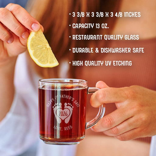 A person is holding a glass mug with a message engraved on it. The image is accompanied by a text overlay that reads • 3 3/8 x 3 3/8 x 3 4/8 inches • Capacity 13 oz. • restaurant quality glass • durable & dishwasher safe • high quality uv etching