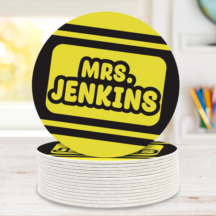 Crayola style coaster displayed on a stack on a wood surface. Highlights design and product thickness.