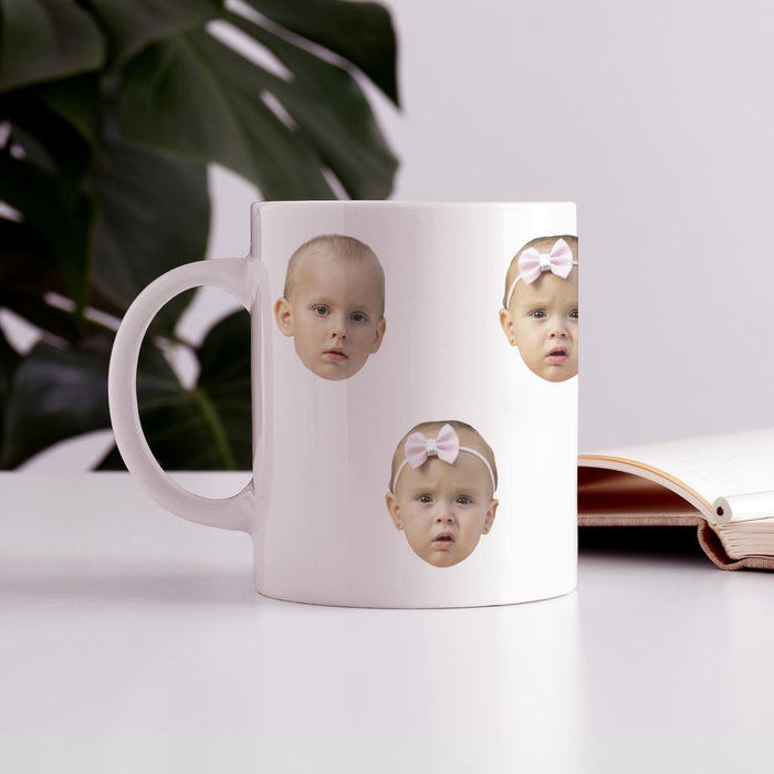 Custom kids faces ceramic mug displayed on a table with home decor.