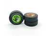 three stacked hockey pucks with printed 1st fathers day designs in the color green and orange with the names Avery and AJ