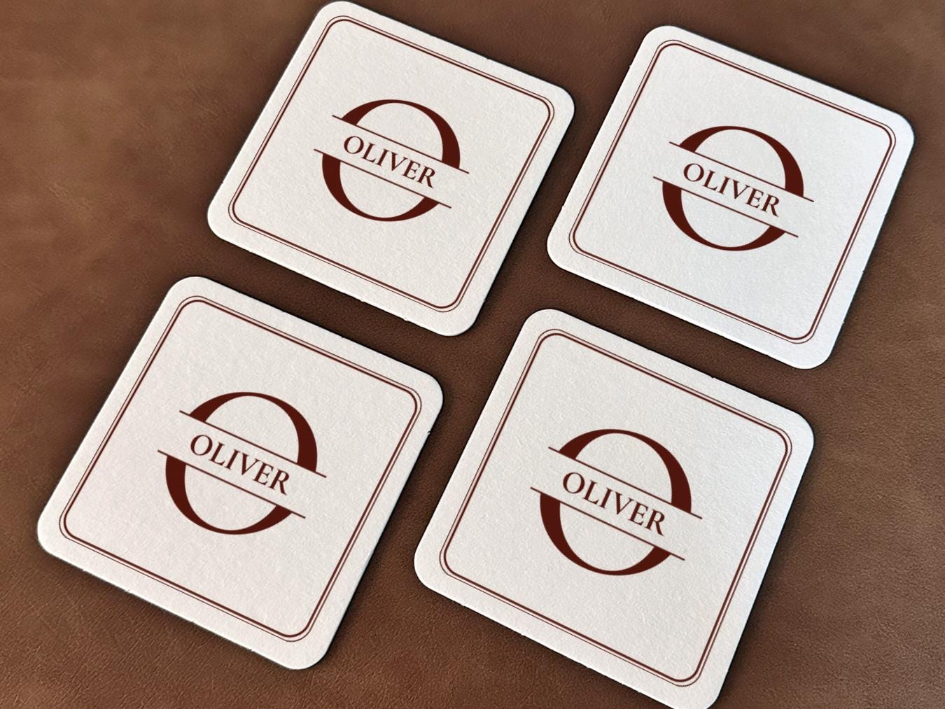 Single coaster is shown on top of a stack of coasters on a white background.