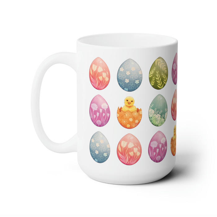 15 oz white ceramic mug with an easter pattern of floral decorated eggs with a baby chick popping out of an egg