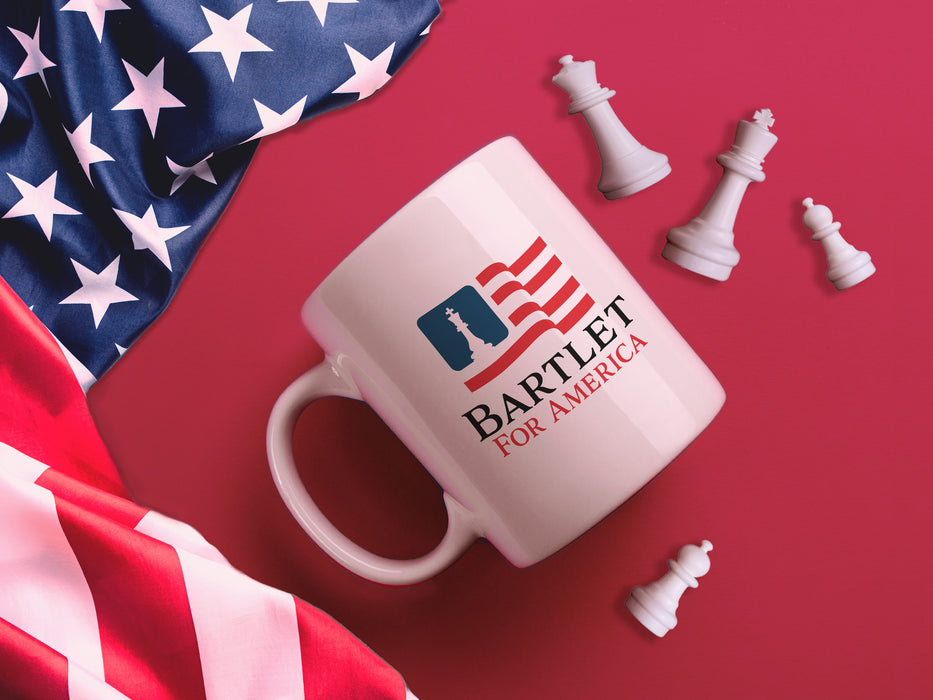 white mug on white background that has red white and blue patriotic American flag design with a king chess piece with Typography that says Bartlet for America on red background next to American flag surrounded by chess pieces