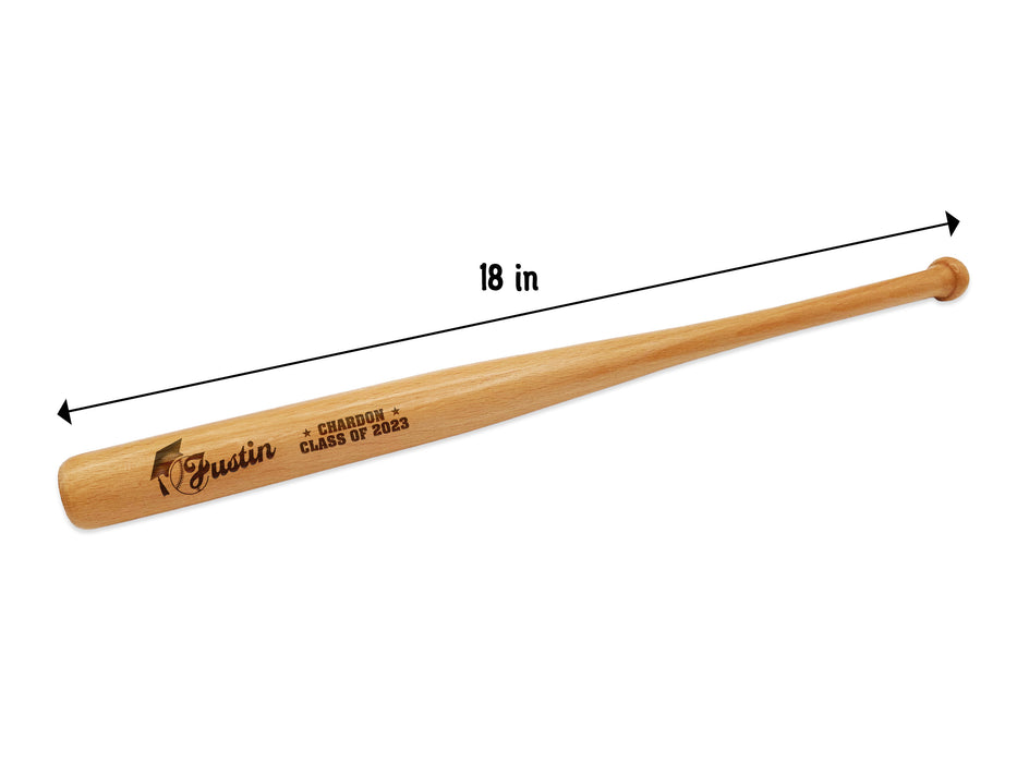 bat measures 18 inches wooden mini baseball bat with custom laser engraved design that features a name with a graduate cap and says "Justin, Chardon, Class of 2023" on a white surface