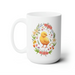 15 ounce white ceramic mug with spring easter art of a baby chick surrounded by various colorful flowers