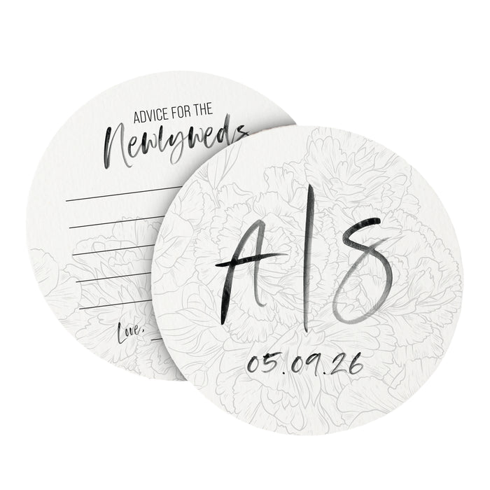 Two coasters are shown stacked on top of each other a white background. Coasters show the front and back of the Floral Initial design. This design uses black ink on both sides with floral line art and brush script text.