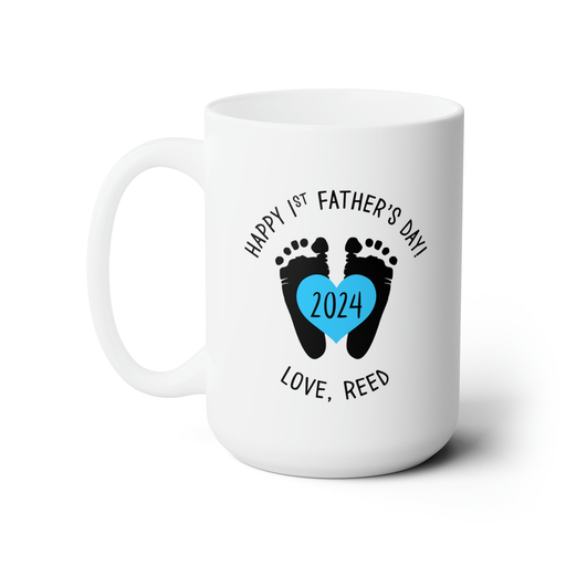 white ceramic mug that says happy first fathers day love Reed with a footprint design with a blue heart with the year 2024 in it