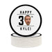 A single coaster is shown on top of a stack of other coasters. Coasters are shown with custom face and text design. Coasters read Happy 30th Kyle! Coasters are designed with black text and a custom face photo.