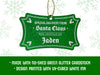 A green glitter cardstock hanging Santa gift tag is shown on a white background with green snowflakes. Text underneath the tag reads: Made with no-shed green glitter cardstock, Design printed with UV-cured white ink.