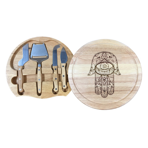 wooden cheese board with laser engraved Hamsa design on white background showing cheese knife set