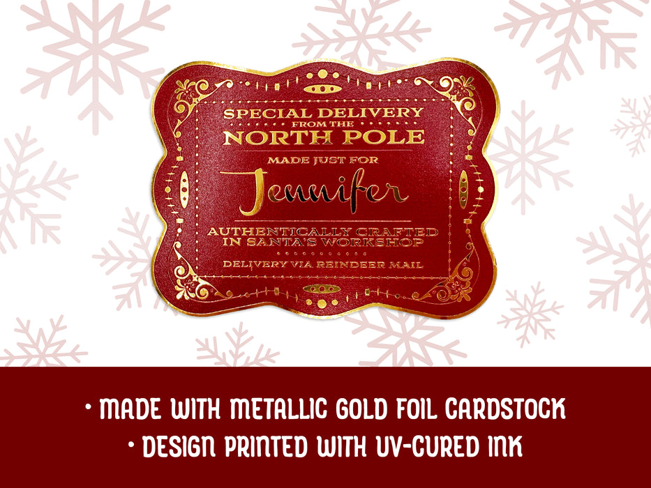 A gold foil cardstock Santa gift tag is shown on a white background with red snowflakes. Text underneath the tag reads: Made with metallic gold foil cardstock, Design printed with UV-cured ink.