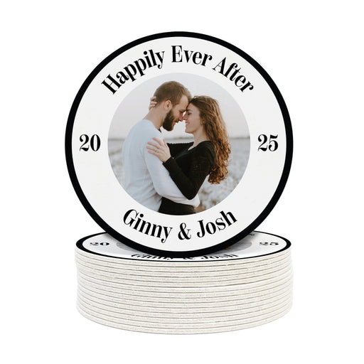 A stack of wedding coasters with a picture of a couple and custom text on it.