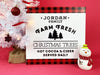 Canvas is shown with white Christmas tree and ceramic snowman. Farm Fresh Christmas Trees design shown on canvas. Design has red and black plaid border with the black text, Jordan Family Farm Fresh Christmas Trees Hot Cocoa & Cider Served Daily.