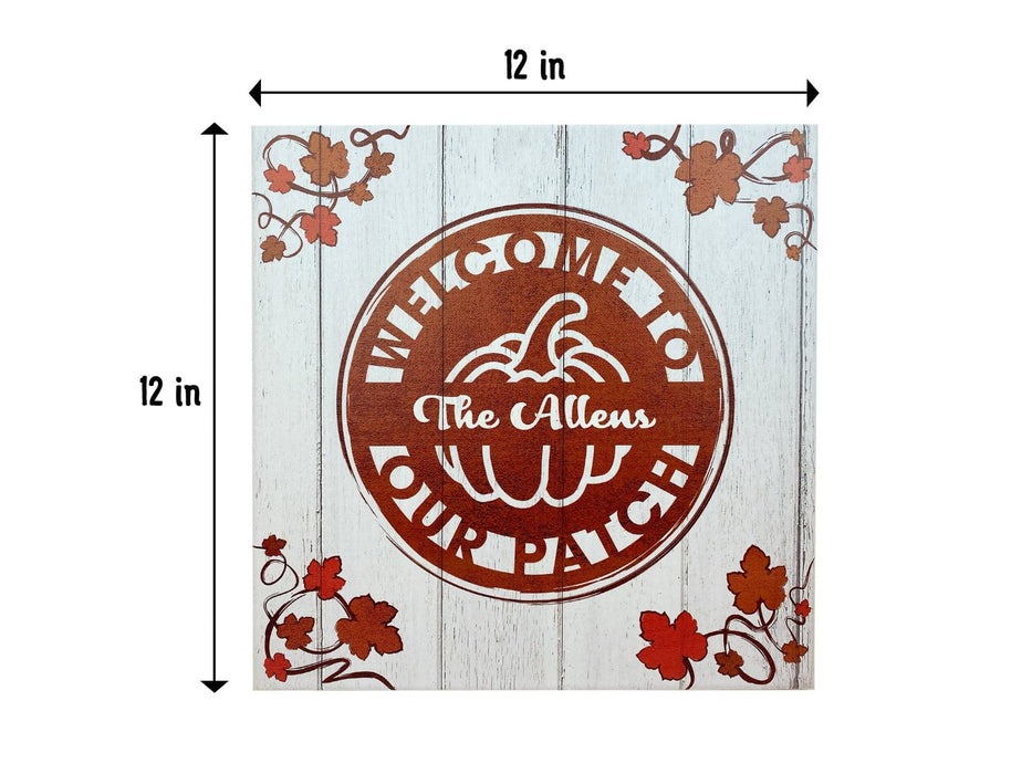 Canvas measures at 12in x 12 in. Canvas has design with pumpkin and pumpkin foliage on sides. Design says Welcome to Our Patch and The Allens.