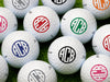 Multiple golf balls shown with circle monogram design in all available colors.