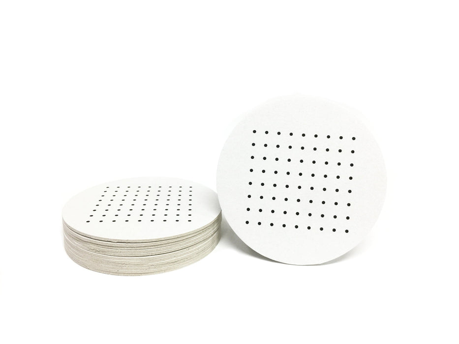 Single coaster is shown sitting next to a stack of coasters on a white background. Coasters feature Dots and Boxes Game design. This design has black dots printed on white coasters.