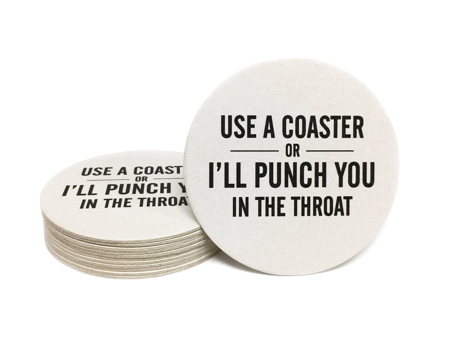 Single coaster is next to a stack of coasters on a white background. Coasters feature Use a Coaster or I'll Punch You in the Throat design.