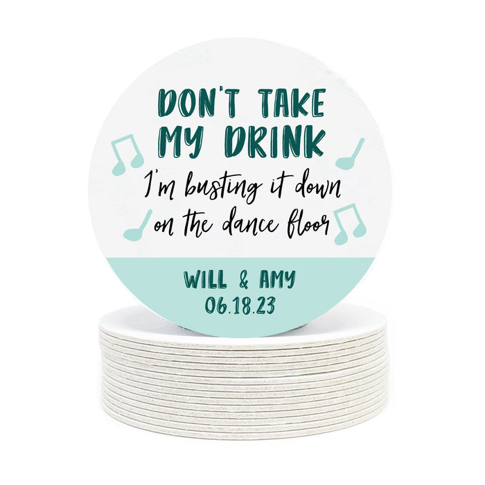 Single coaster is shown on top of a stack of coasters. Coasters say Don't take my drink, I'm busting it down on the dance floor. Married couple names are below with wedding date.