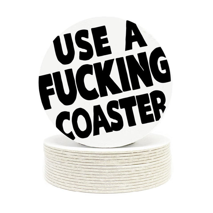 Single coaster is shown on top of a stack of coasters on a white background. Coasters feature Use A Fucking Coaster design.